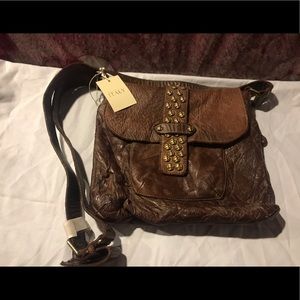 Italian genuine soft leather cross body bag.